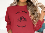 Dwell More Fear Less Mountain Graphic Sweatshirt